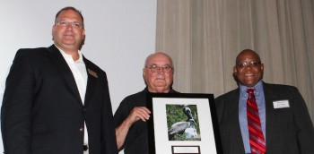 Marc McCloskey (left) and Keith Walker (right) accepted the Award from federation's Vice President, Dick Bierly.
