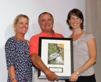 Jamin Simmons (center) with wife Pam (left) and Erin Fleckenstein, federation's coastal scientist in Manteo office.