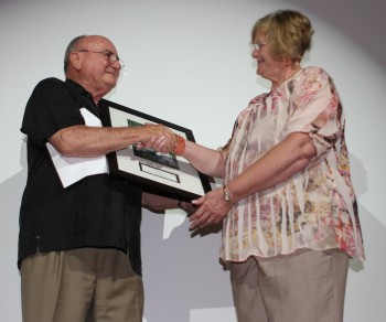 Pat Armstrong accepting the Award from federation's Vice President, Dick Bierly