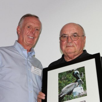 J. Taylor Ryan (left) accepts the Award from federation's Vice President, Dick Bierly.