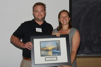 Cliff Cash accepting the award from federation's STAN coordinator, Sarah Gilliam.