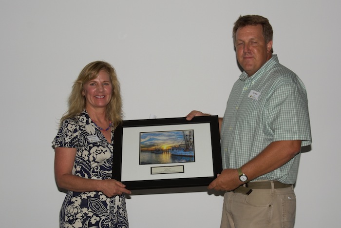 Sandie, Cecelski accepting the award from federation's education coordinator, Ted Wilgis.