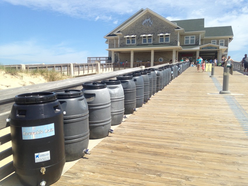 Rain Barrels lined up at Jennette's Pier for participants at Earth Fair to win.