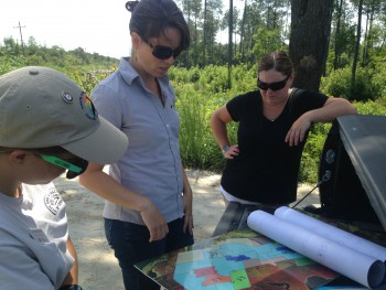 Federation scientist, Erin Fleckenstein explaining the project to consultants Melissa Midgett and Amanda Miller, during a recent site visit.