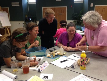 The teachers participated in a variety of hands-on learning both indoors and out as shown here with Terri Kirby Hathaway.