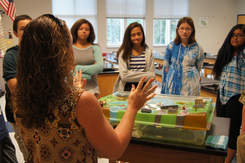 Students get to see how stormwater makes its way into coastal waters with a demonstration.