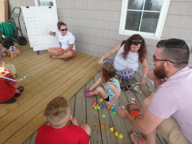 Erica Connery, AmeriCorps member with the federation’s Wanchese office, records data during the marine debris egg hunt.