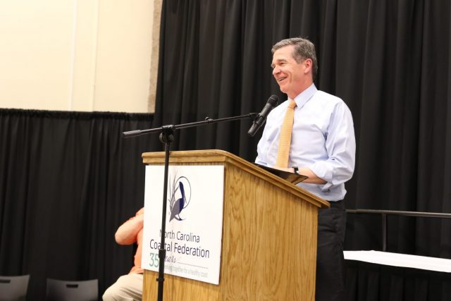 Gov. Roy Cooper provides remarks at the Pelican Awards. He spoke about the importance of the coastal environment, about the need to prioritize climate change and about his opposition to offshore oil drilling and seismic blasting.