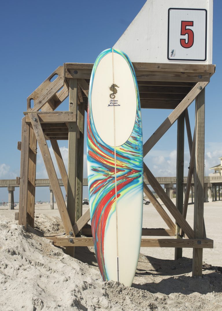 Surfing legend donates personal board for federation event North