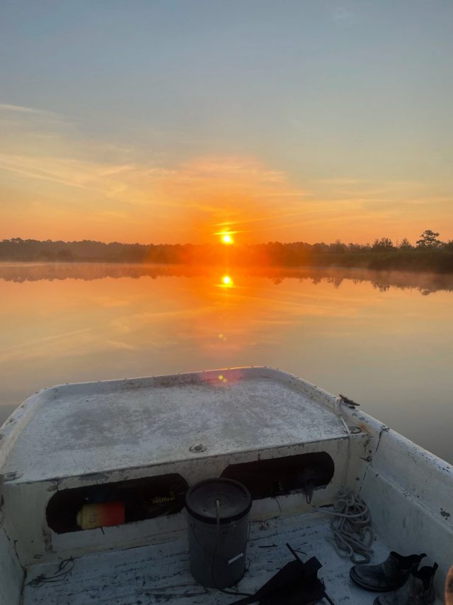Sunset from a skiff used to collect Marine Debris