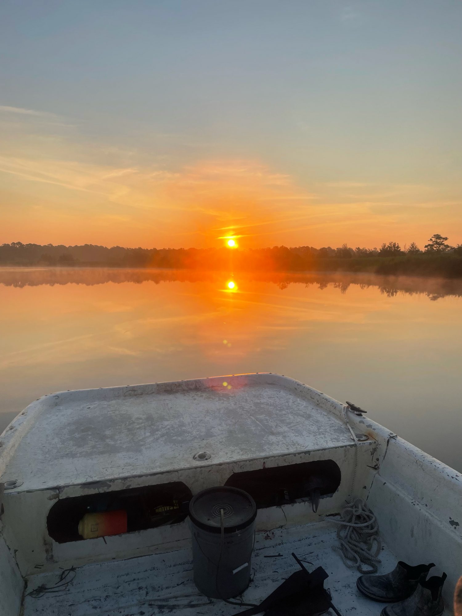 Sunset from a skiff used to collect Marine Debris