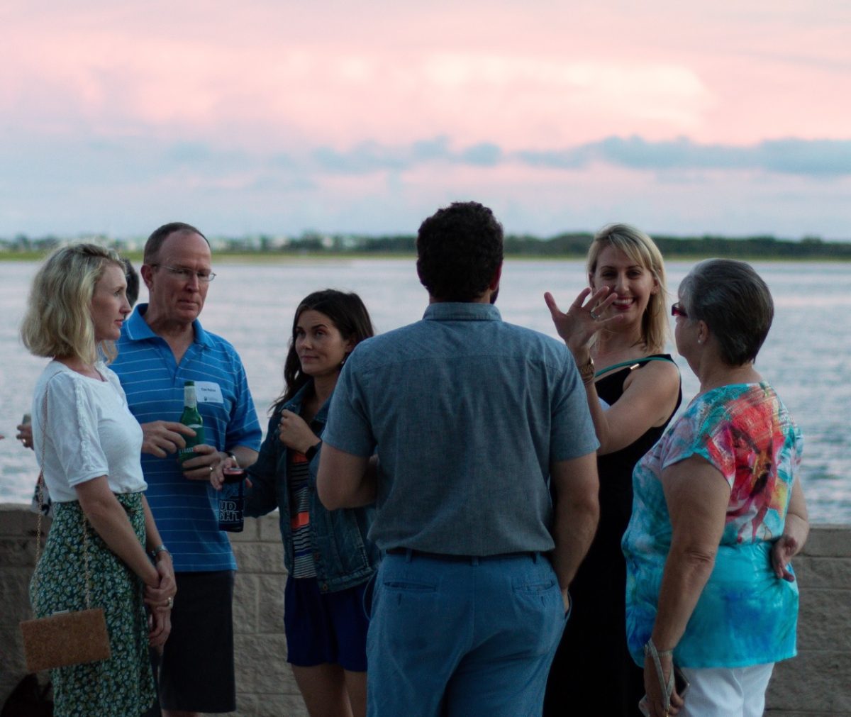 Guests enjoy a sunset on Bogue Sound at a Federation reception.