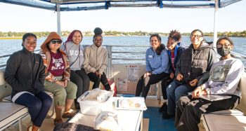 A group of NC Central University Students head out to Hammocks Beach State Park with Coastal Educator Rachel.