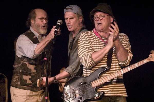 An image of the band King Mackerel and the Blues are Running preforming on stage