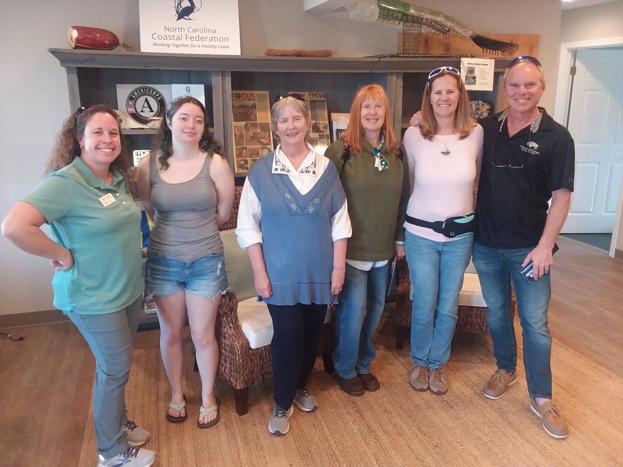 Coastal Education Coordinator Sara Hallas poses with members of the Citizens Climate Lobby following a tour at the Federation.